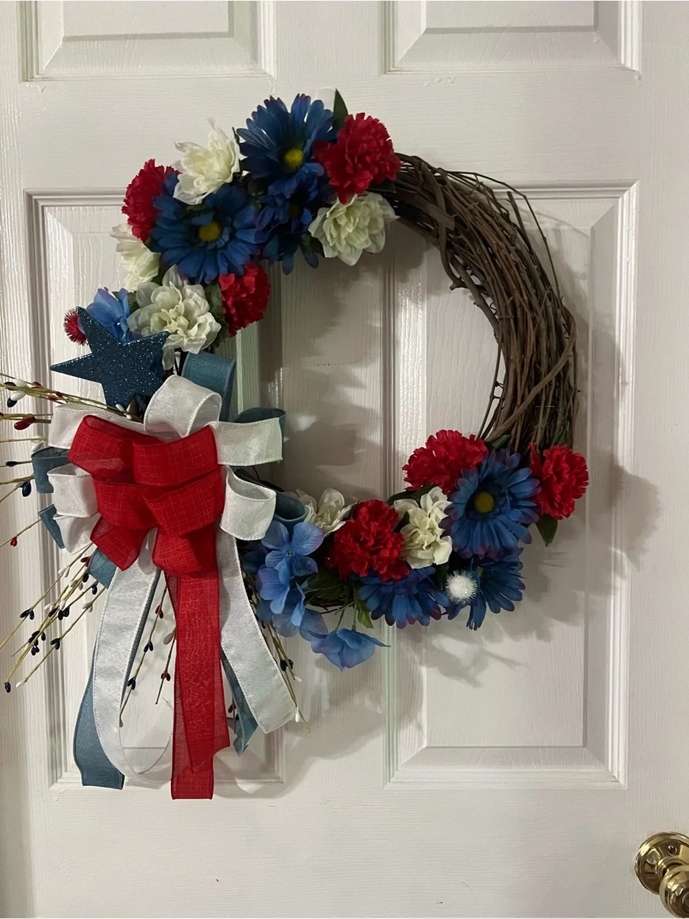 Patriotic Red White and Blue Floral Grapevine Wreath